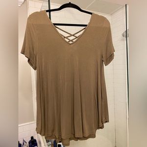 Small army, green shirt with lattice cut outs on back